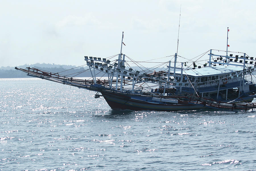 Large Fishing Boat in the Mentawai Islands by Claudio Paschoa