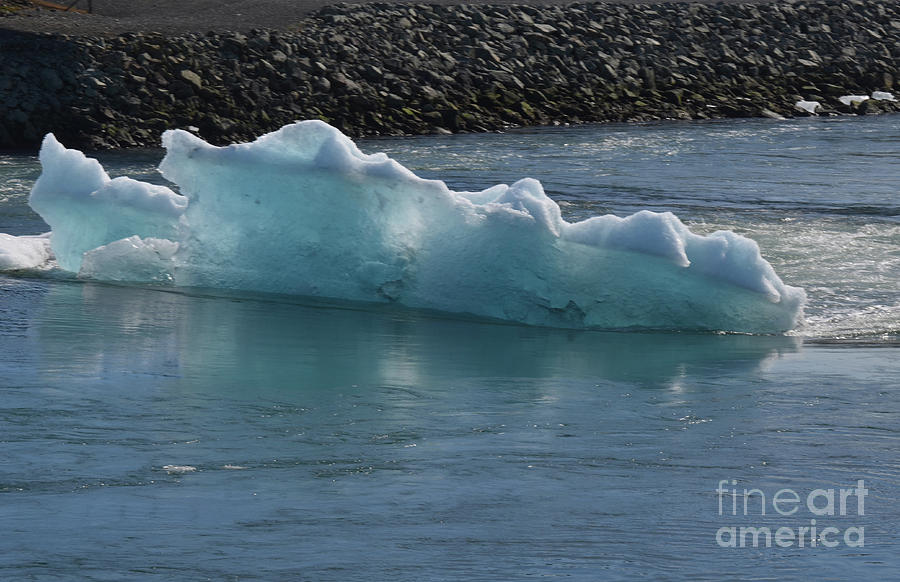 Large icecap floating in an icelandic lagoon  Photograph by DejaVu Designs
