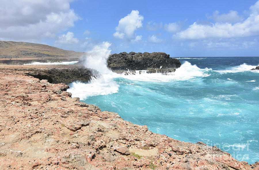Large Waves Splashing Against the Rock Cliffs in Aruba Photograph by DejaVu Designs