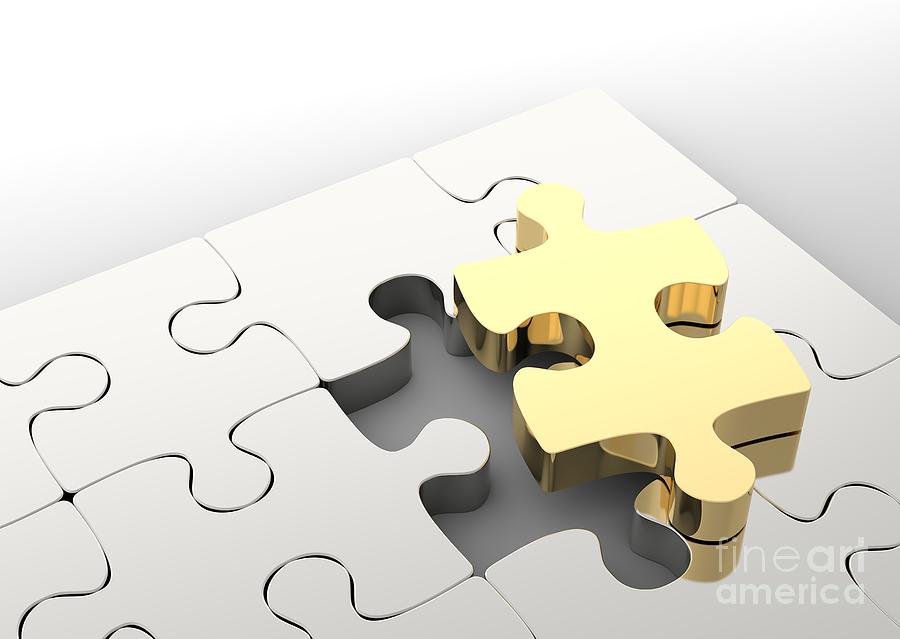 Last golden puzzle piece to complete a jigsaw. . Concept of business solution Photograph by Michal Bednarek