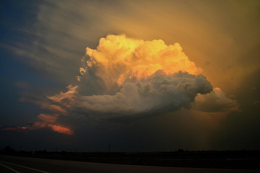 Last Light on Thunderheads over I-76 in Eastern Colorado Photograph by Ray Mathis