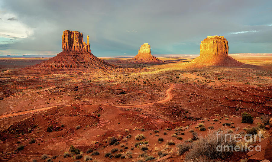 Last Light Over Monument Valley Photograph by Mimi Ditchie