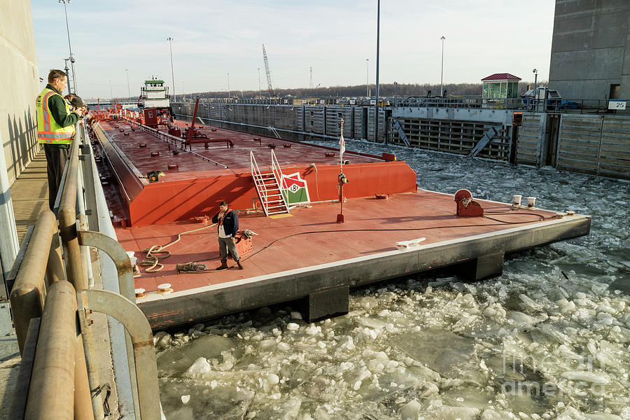 Lat Gonsolin locking through Melvin Price Lock and Dam Photograph by Garry McMichael