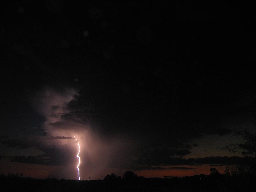 Late summer storm  with lightning Casa Grande Arizona 2004 Photograph by David Lee Guss