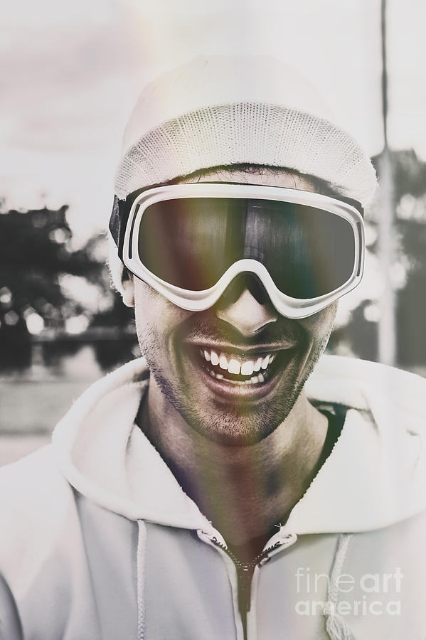 Laughing man wearing ski mask on winter holiday Photograph by