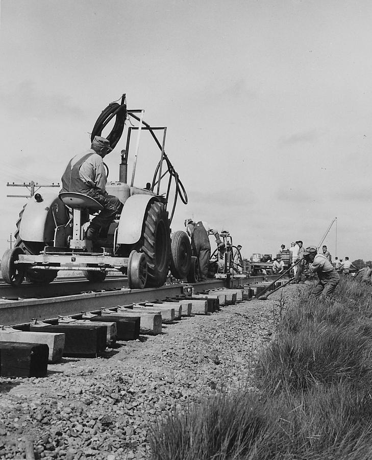Laying Down Rail - 1957 Photograph by Chicago and North Western Historical Society
