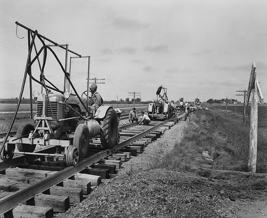 Laying Down Tracks - 1957 Photograph by Chicago and North Western Historical Society