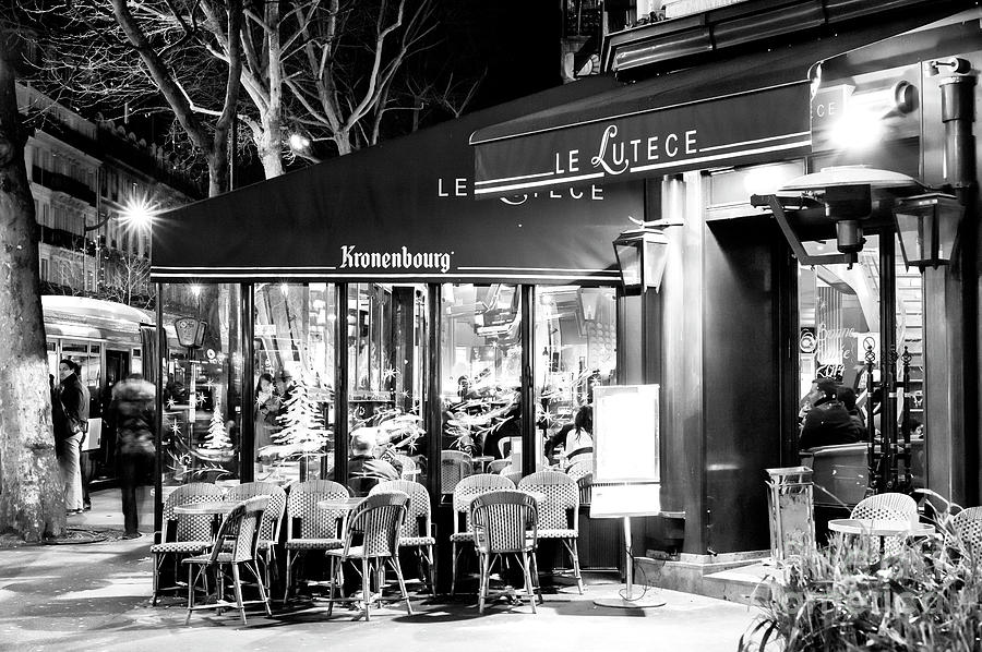 Le Lutece at Night Paris Photograph by John Rizzuto