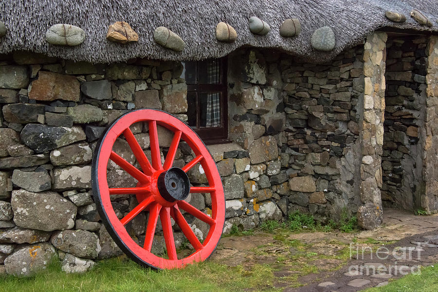 Leaning Wagon Wheel Photograph by Bob Phillips