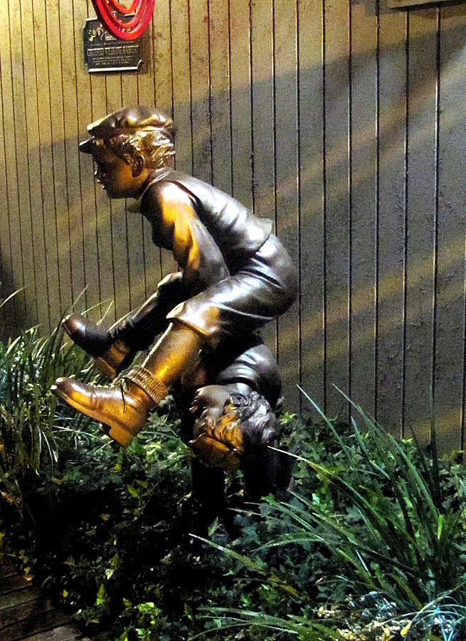 Leap Frog Statue  Photograph by Christopher Mercer