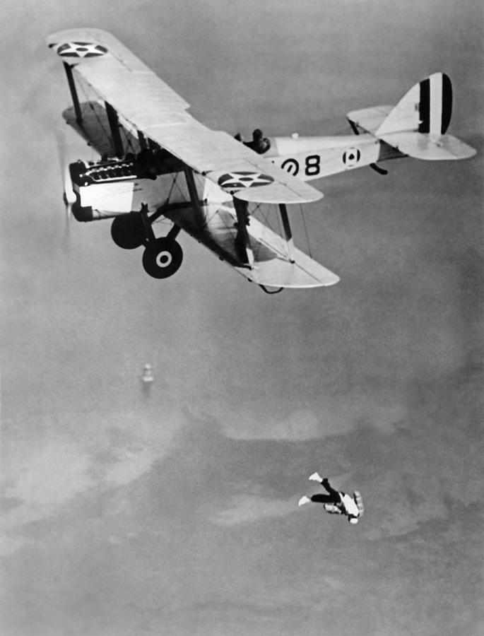 Leaping From Army Airplane Photograph by Underwood Archives
