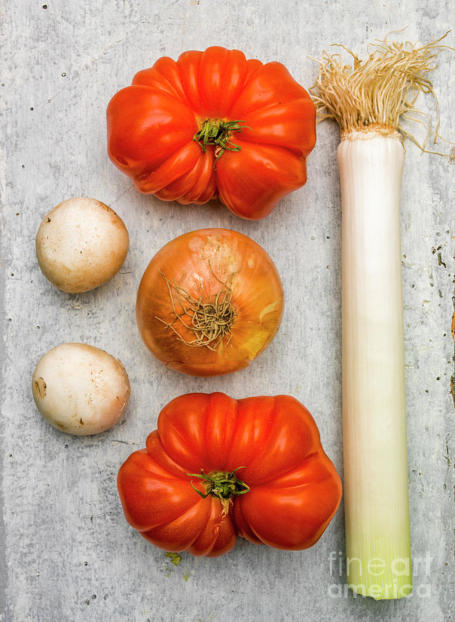 Onion Photograph - Leek and tomatoes by Bernard Jaubert