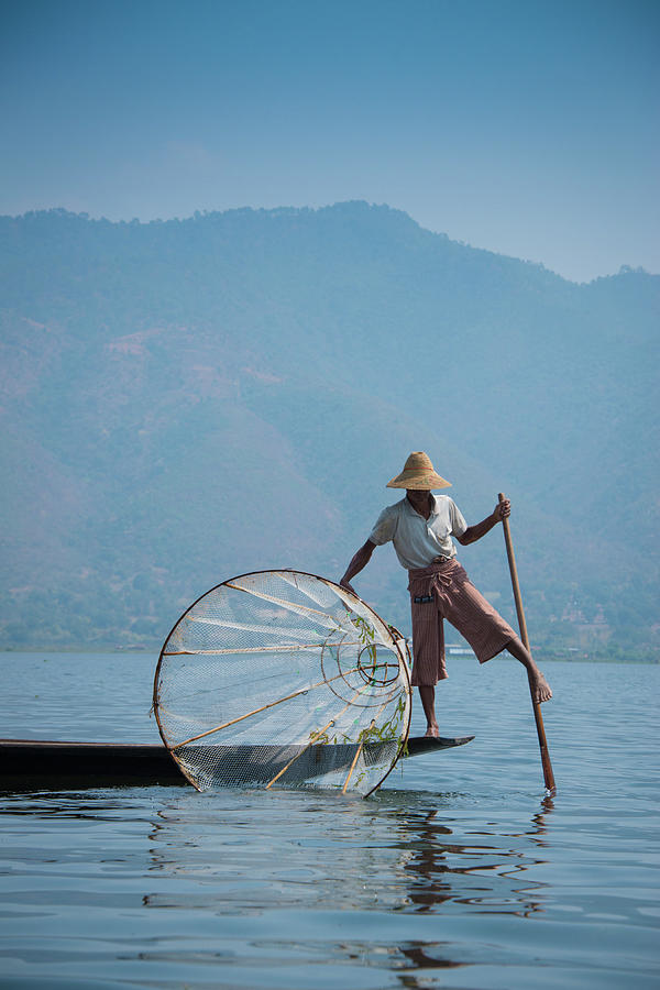 Leg Rower on Inle Lake Photograph by Michele McCormick - Fine Art America