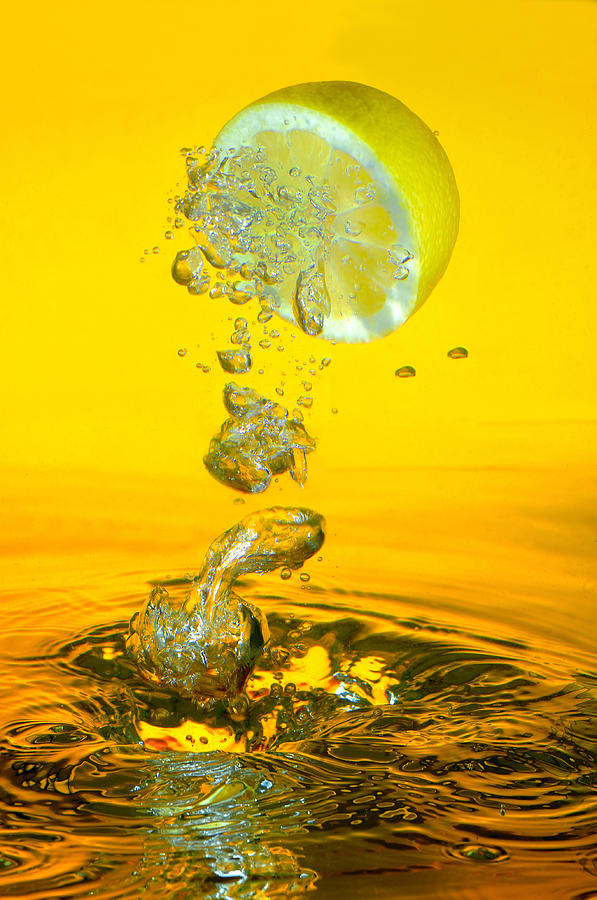 Bottle Photograph - Lemon and bubbles by Travel Images Worldwide