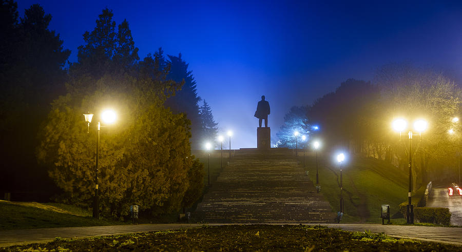 Lenin in fog Photograph by Alexey Stiop