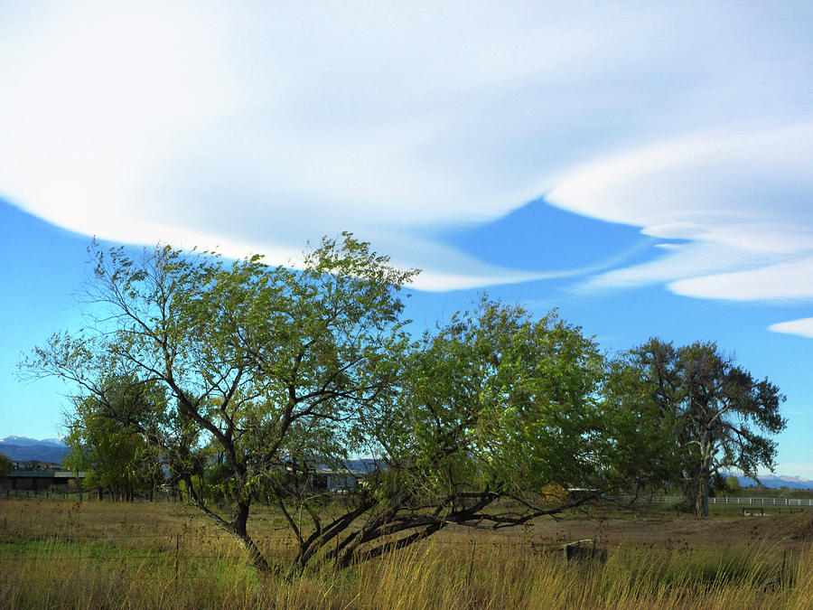 Lenticular Clouds Forming Photograph by Marilyn Hunt