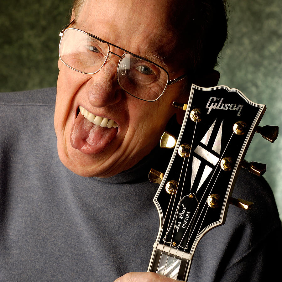 Les Paul with tongue out by Gene Martin Photograph by David Smith