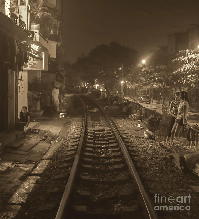 Life on the Tracks Hanoi  Photograph by Chuck Kuhn