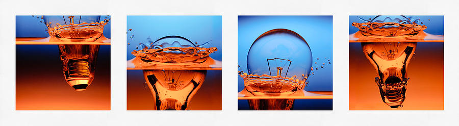 Light Bulb Drop In To The Water Photograph