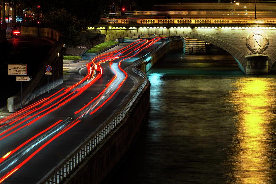 Light Flow To Pont Notre-Dame  Photograph by Hany J