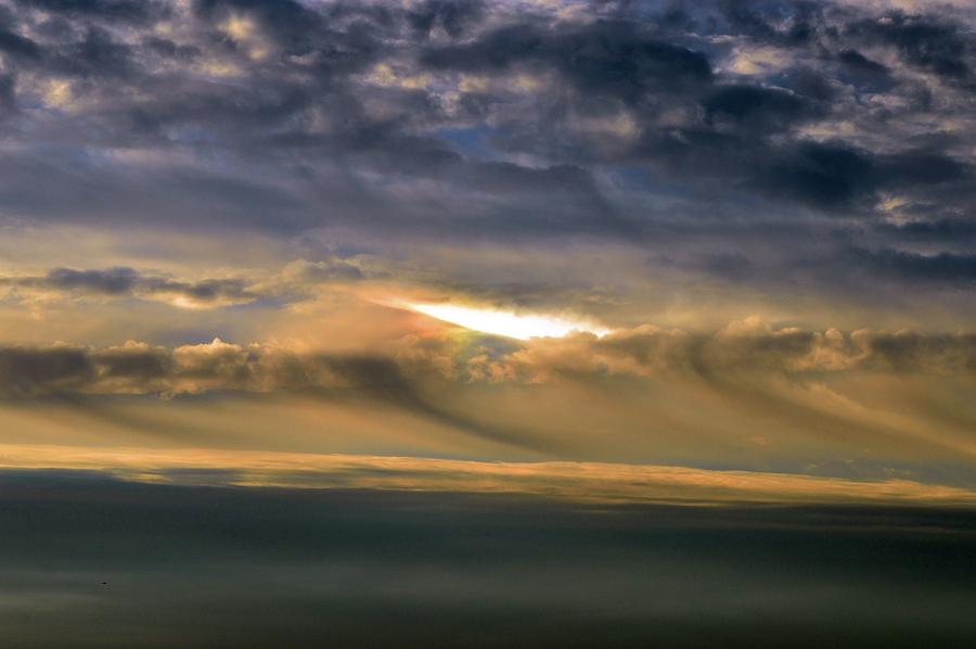 Light In The Cloud  Photograph by Lyle Crump