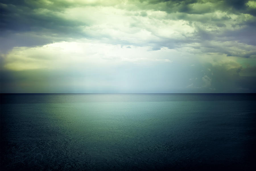 Nature Photograph - Light in the sky above the dark gloomy sea by GoodMood Art