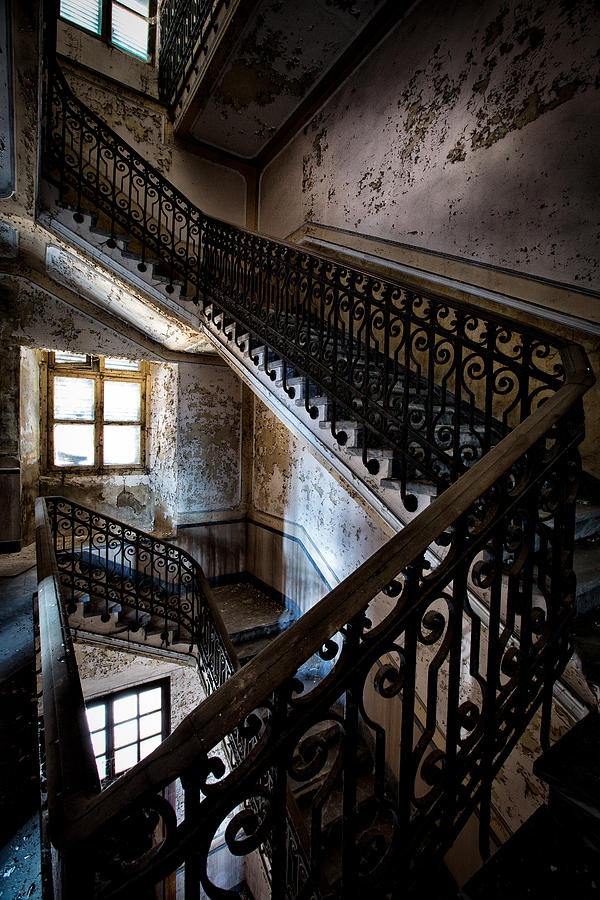 Light on the stairs - urban exploration Photograph by Dirk Ercken