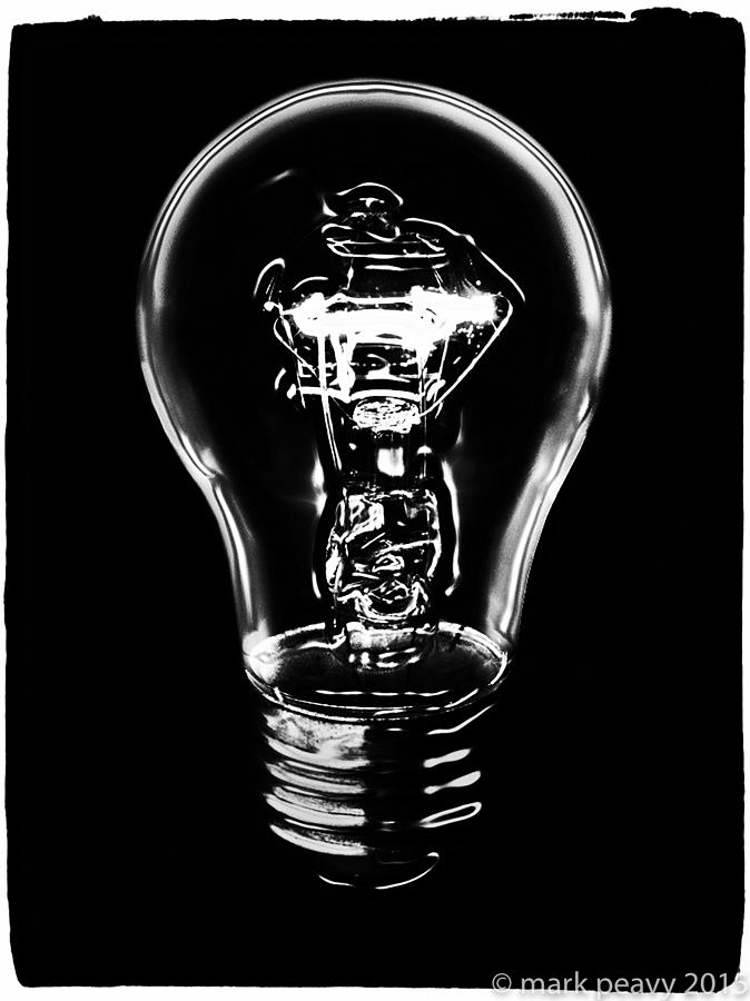 Lightbulb Photograph by Mark Peavy