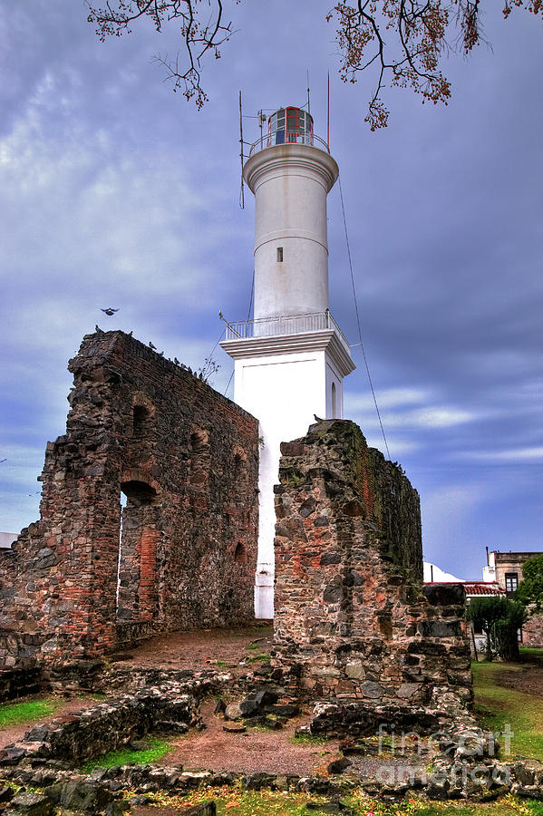 Lighthouse after a storm Photograph by Bernardo Galmarini