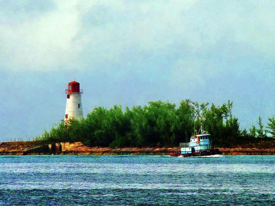 Lighthouse and Boat Nassau Bahamas Photograph by Susan Savad