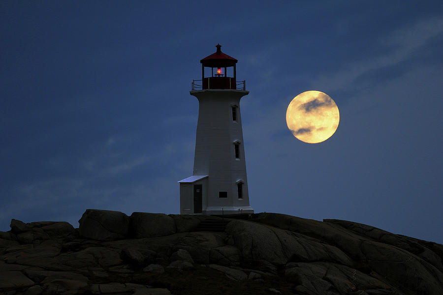 Lighthouse and full moon Photograph by Gary Corbett