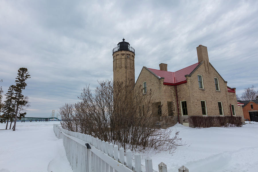 Lighthouse and Mackinac Bridge Winter Photograph by John McGraw