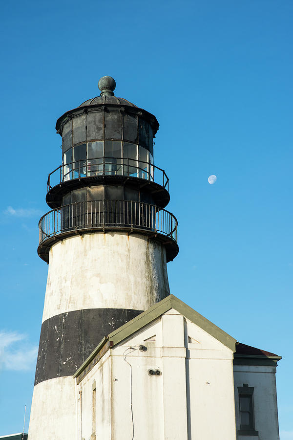 Lighthouse and Moon at Cape Disappointment Photograph by Robert Potts