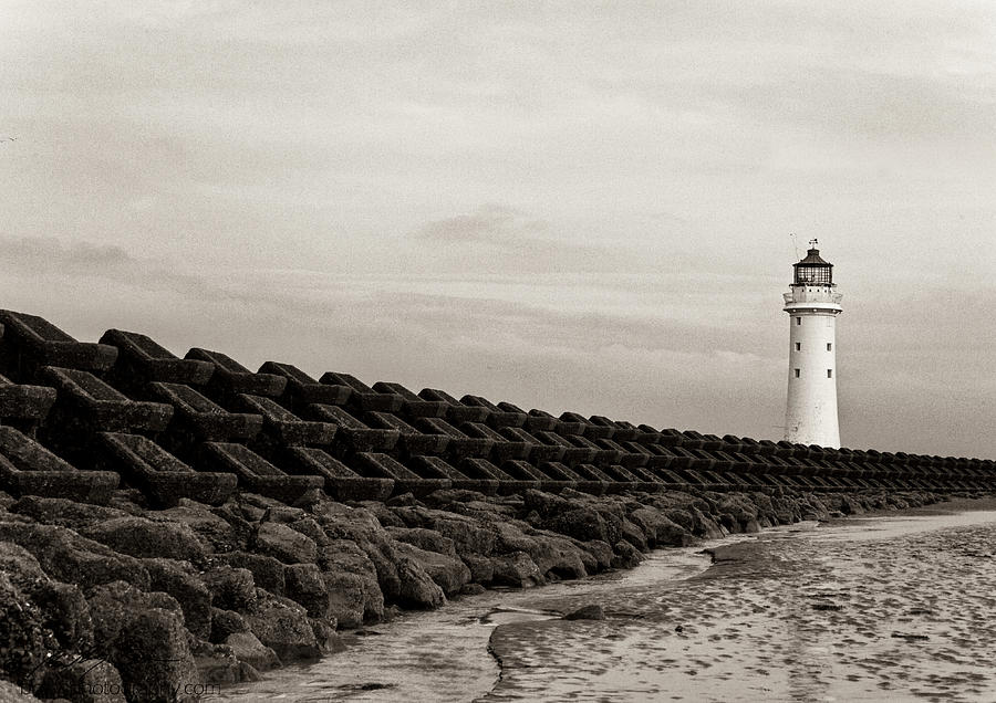 Lighthouse and sea wall 2 Photograph by B Cash