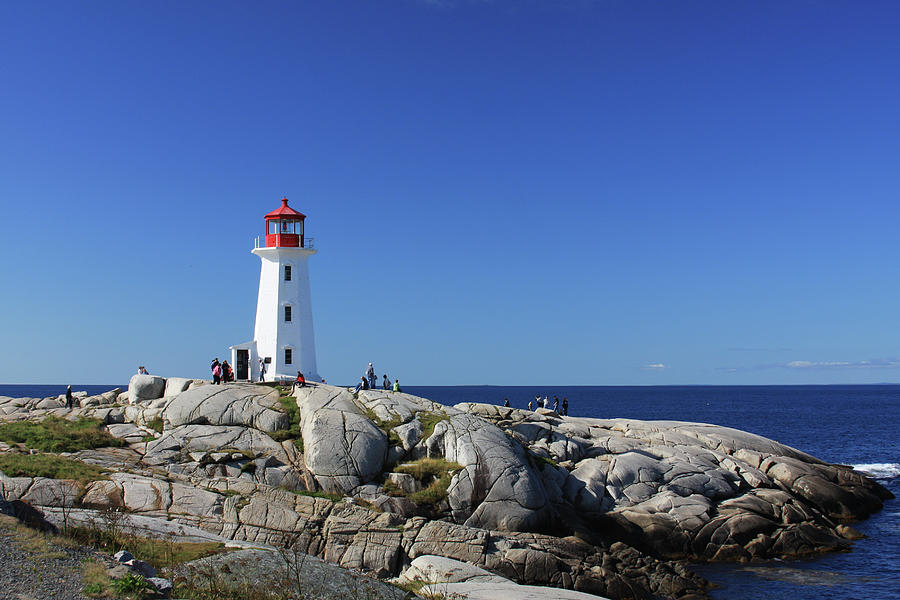Lighthouse at Peggys Cove Photograph by Tatiana Travelways
