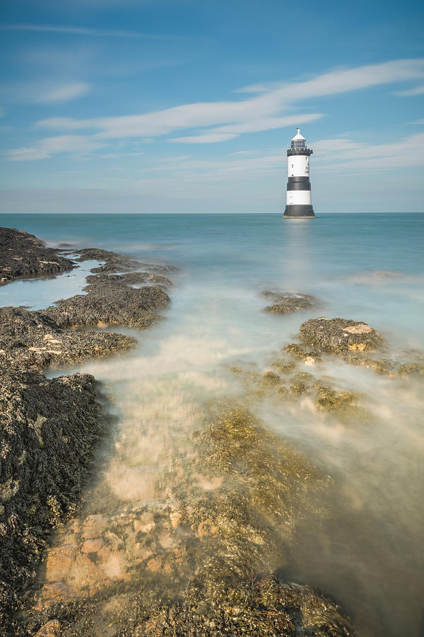 Lighthouse at Penmon Photograph by Andy Astbury