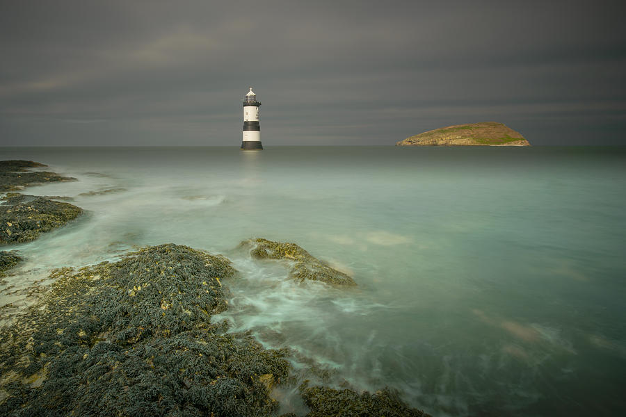 Lighthouse at Penmon Point Photograph by Andy Astbury