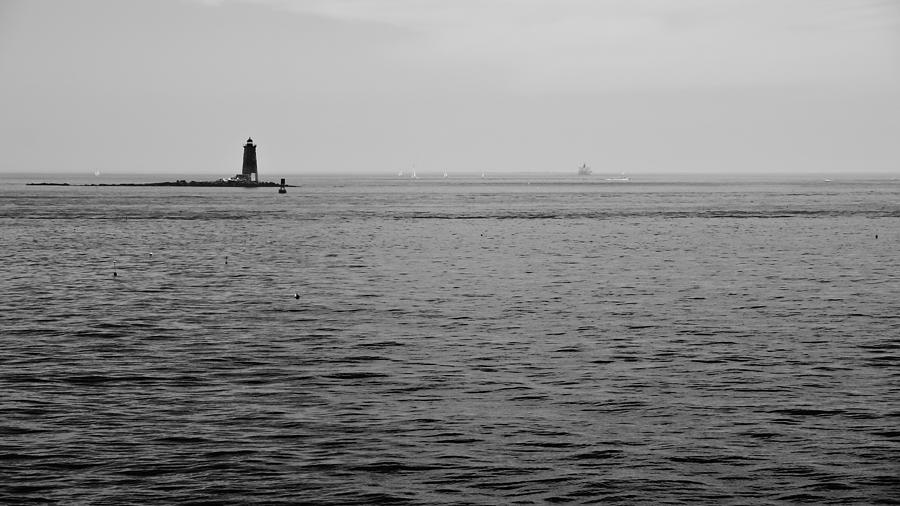 Lighthouse at Sea Photograph by Edward Myers