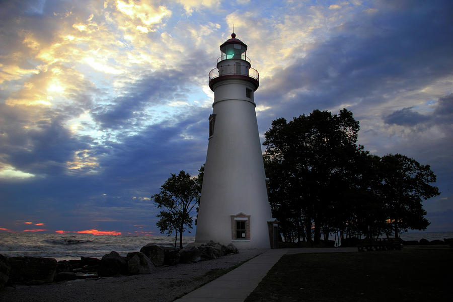 Lighthouse at Sunrise Photograph by Angela Murdock