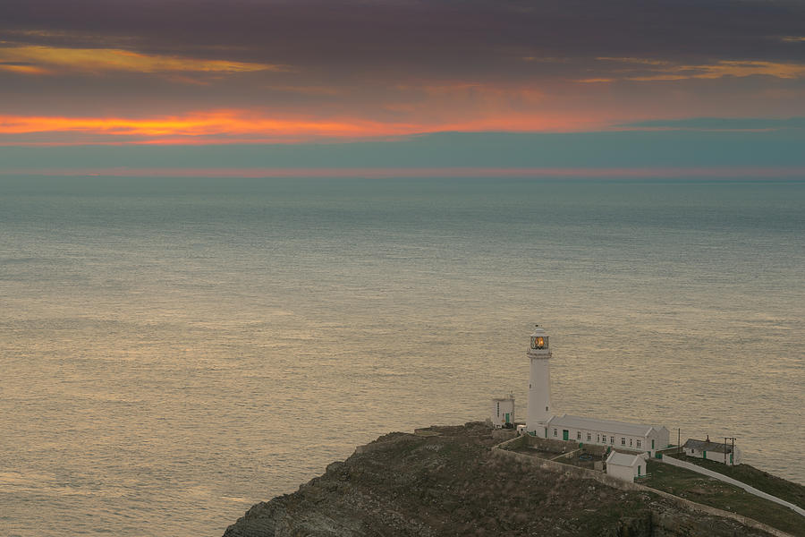 Lighthouse At Sunset,south Stack, Anglesey,north Wales Photograph