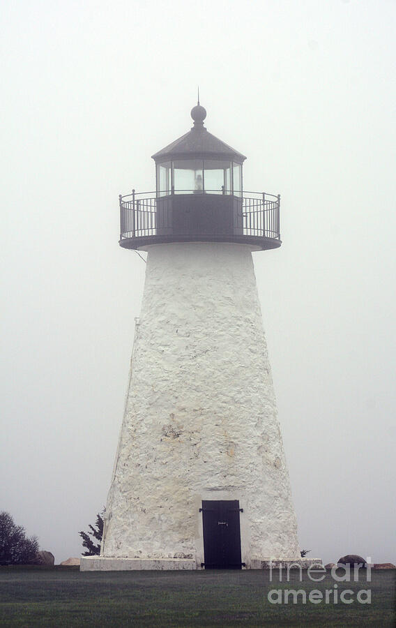 Lighthouse in Fog Photograph by Dianne Morgado