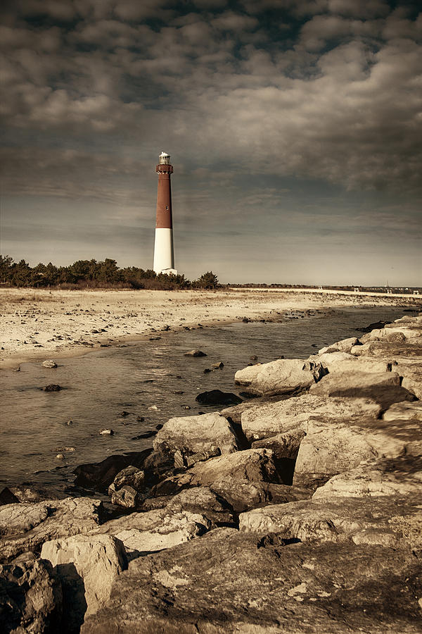 Lighthouse in the distance Photograph by Roni Chastain