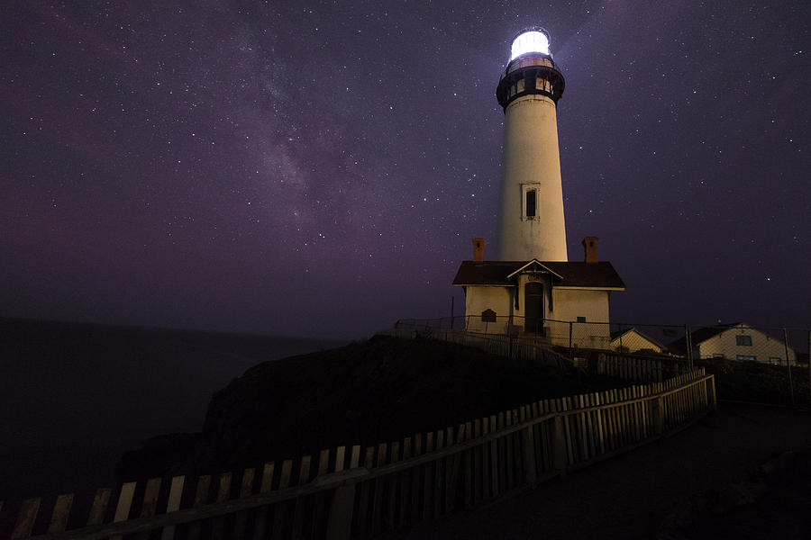 Lighthouse in the Night  Photograph by Janet  Kopper