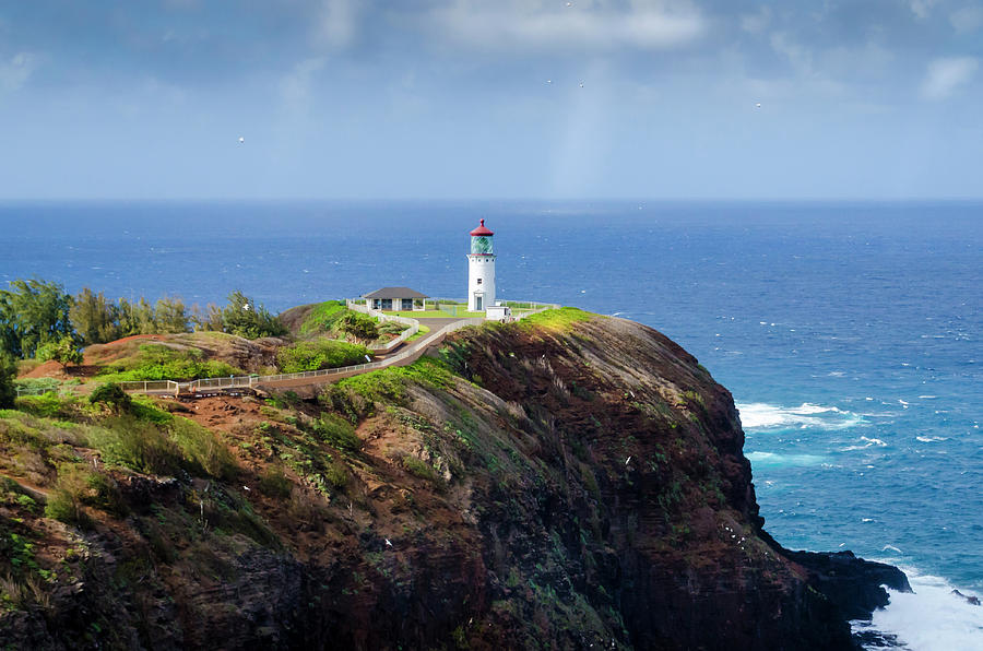 Lighthouse on a Cliff Photograph by Daniel Murphy