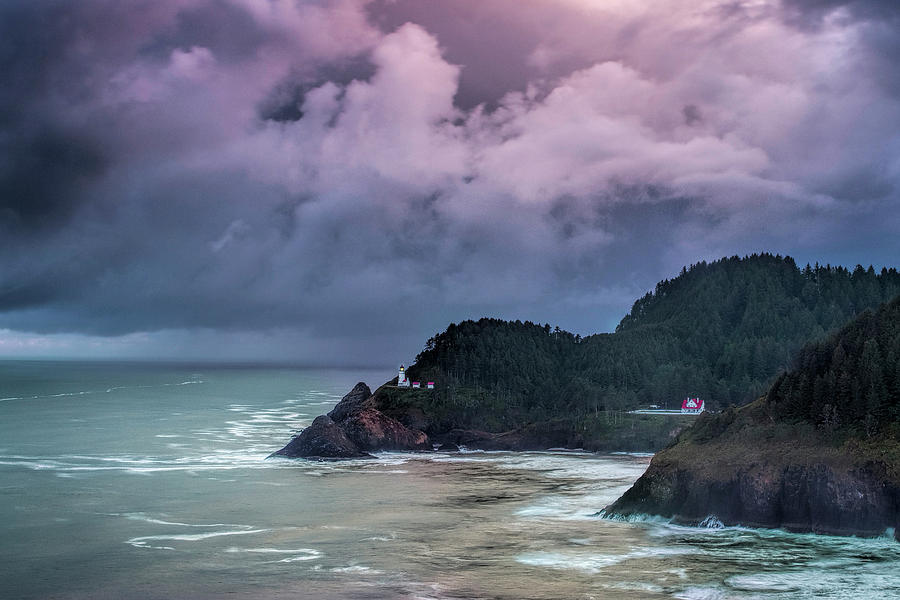 Lighthouse over the Rugged Coast Photograph by Andrew Soundarajan