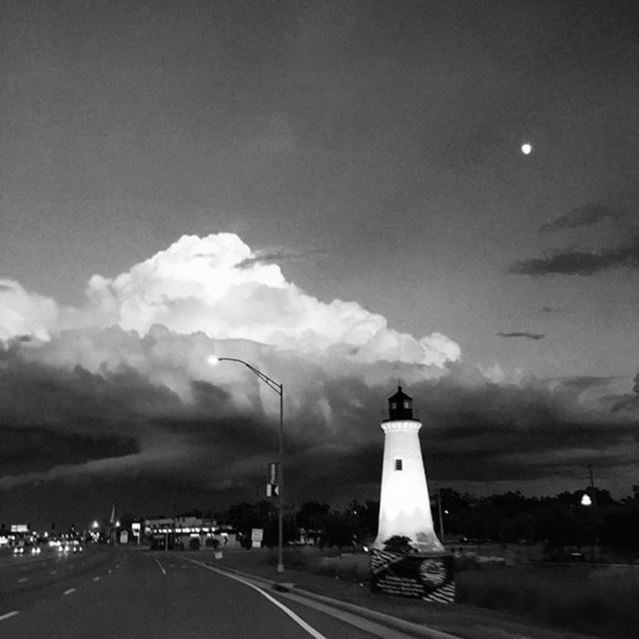 Noir Photograph - Lighthouse, Storm Clouds And The Moon by Joan McCool