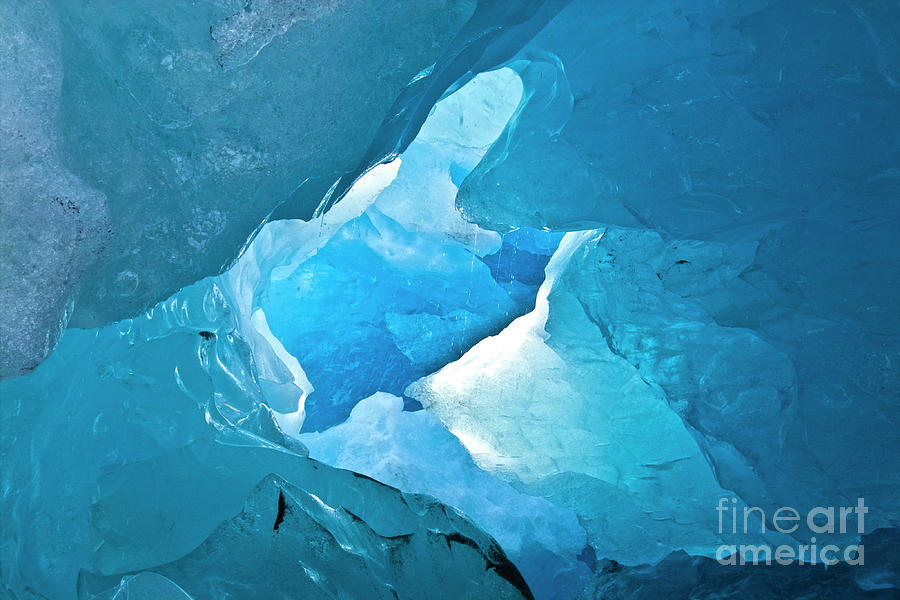 Winter Photograph - Lighting in nigardsbreen glacier grotto 2 by Heiko Koehrer-Wagner