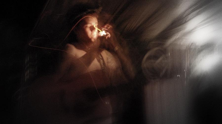 Lighting the Cigarette Photograph by Karen Musick