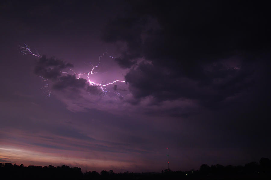 Lightning at Sunset Photograph by Mark Dodd