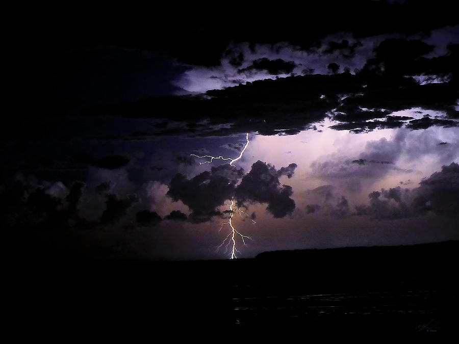 Lightning Behind Cloud Photograph by Michael Blaine